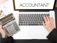 business accountant with document graph financial and calculator on office table. concept planning budget and audit.